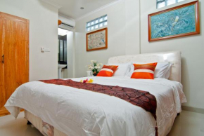 Отель Kuta EcoStay  Kuta